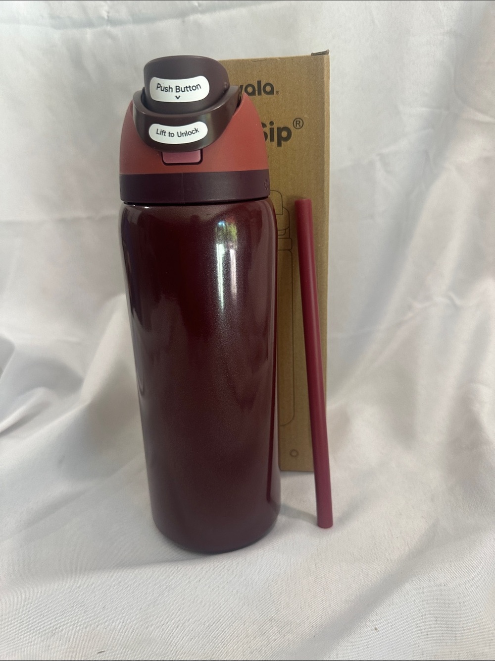 Owala insulated water bottle with a built-in straw. Burgundy 32oz